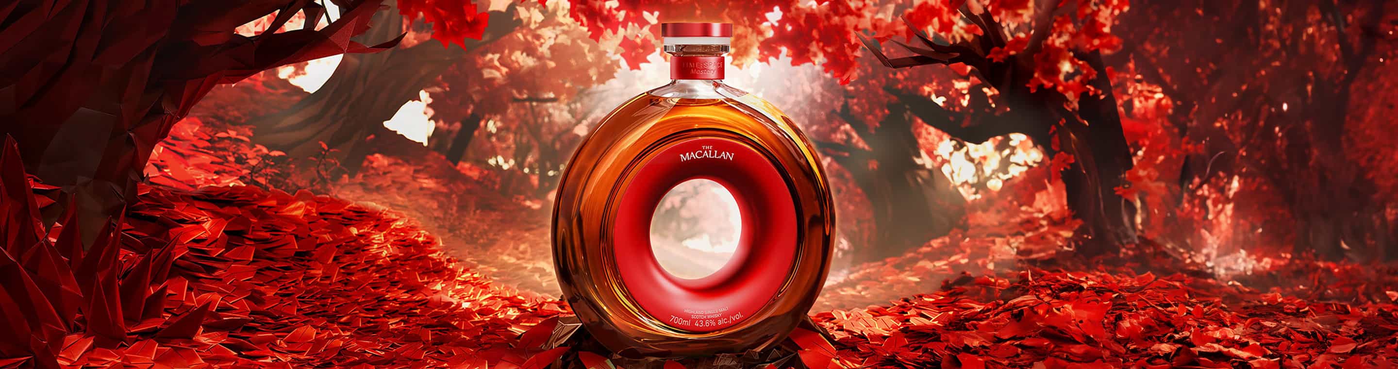 Imagen de una botella de whisky THE MACALLAN circular con un oyo en medio, entre un bosque de ojas rojas.