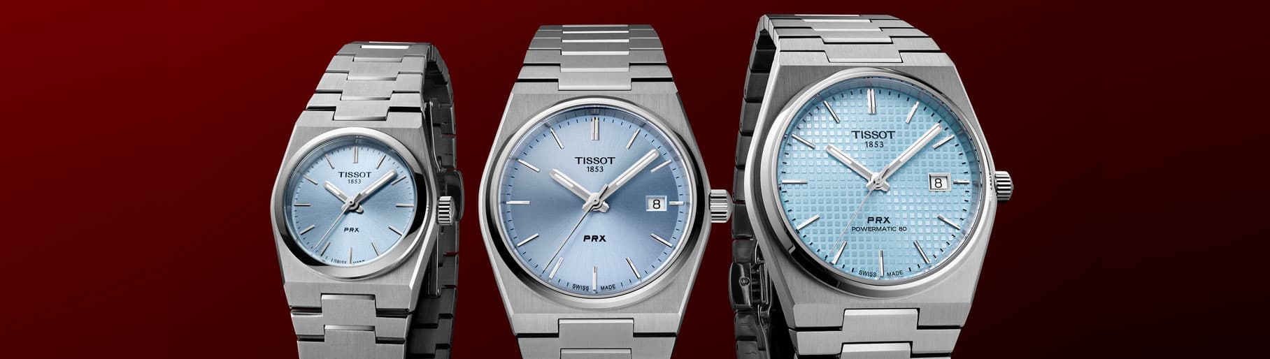 Imagen de tres relojes plateados con caratula azul. TISSOT.